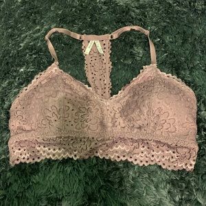 in good condition. It’s a purple bra with a t back